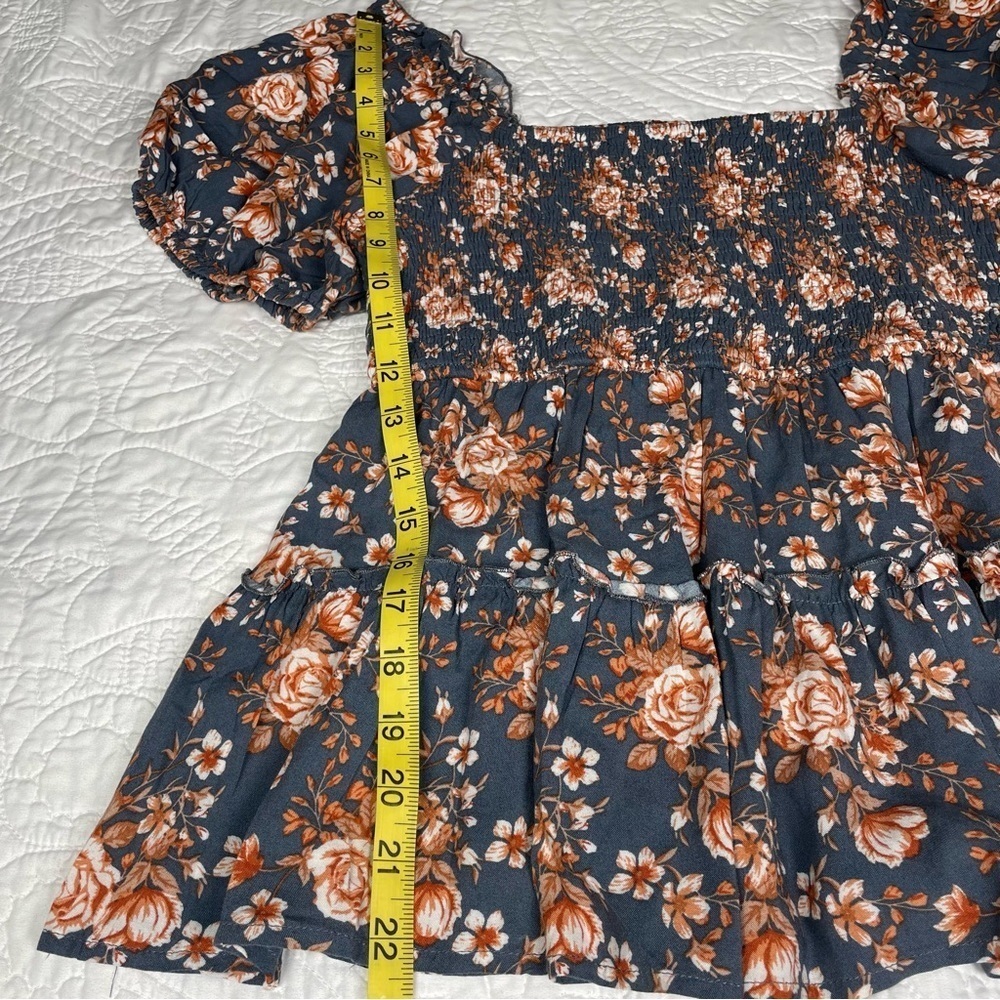 Blue Floral Smocked Babydoll Top by Listicle Size M
Puffed Sleeves Vintage Vibes - Picture 8 of 12